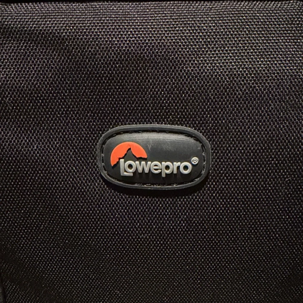 Lowepro Format 140 padded camera case w/handle & shoulder or crossbody strap
